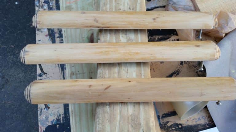 long wooden dresser handles in natural state without paint
