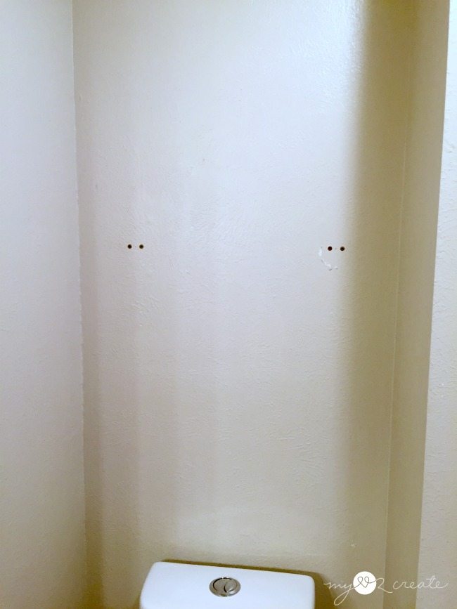 bathroom wall before reclaimed wood shelves