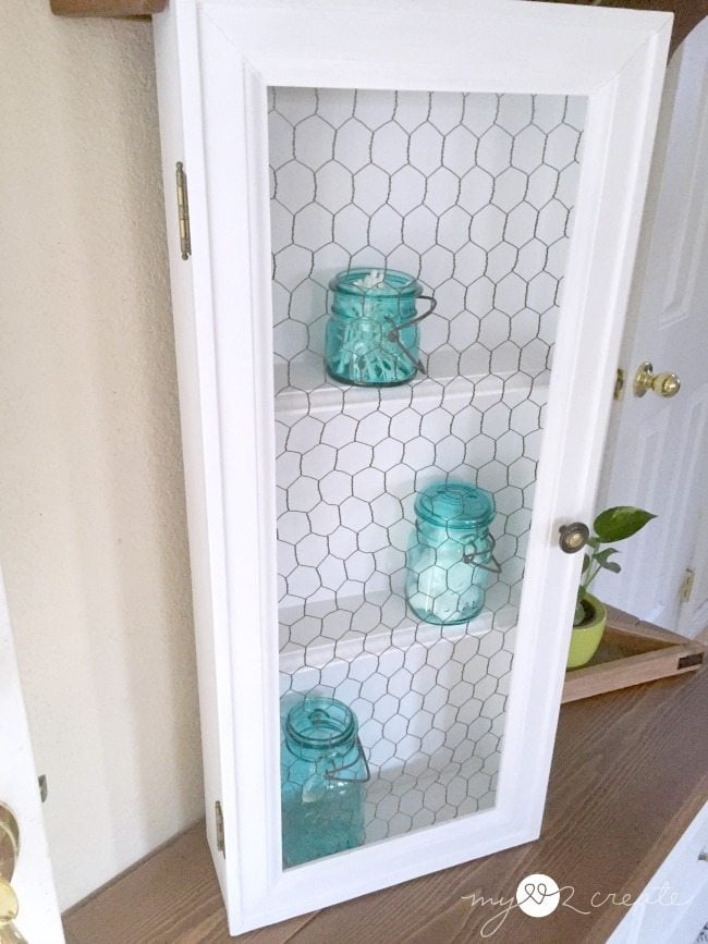 old drawer cabinet with chicken wire door MyLove2Create for MyRepurposedLife.com