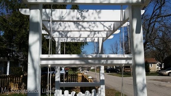 hanging gutter planters on the arbor