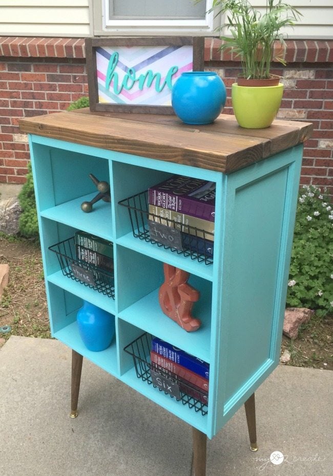 Add style to your home by building your own Repurposed Cupboard Door Bookshelf with this easy to follow picture tutorial. #MyRepurposedLife #MyLove2Create #upcycle #repurpose #cabinetdoor #cupboard #bookshelf #cabinet via @repurposedlife