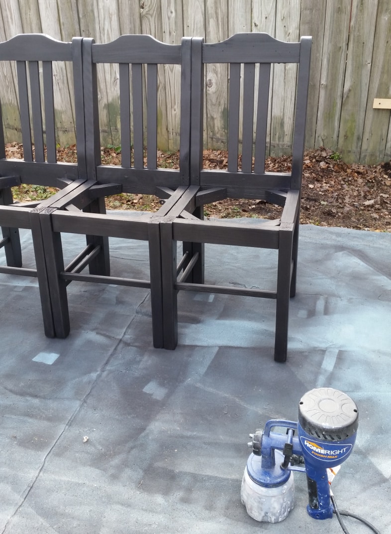 a paint sprayer and a triple chair bench