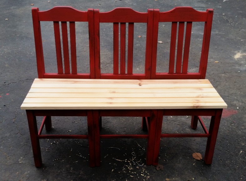three chair red bench with new boards for a seat