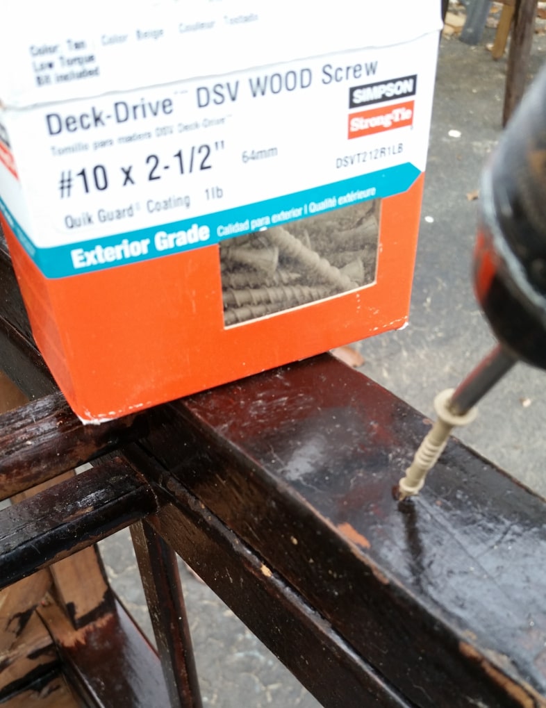 wood screws attach chairs to make a bench