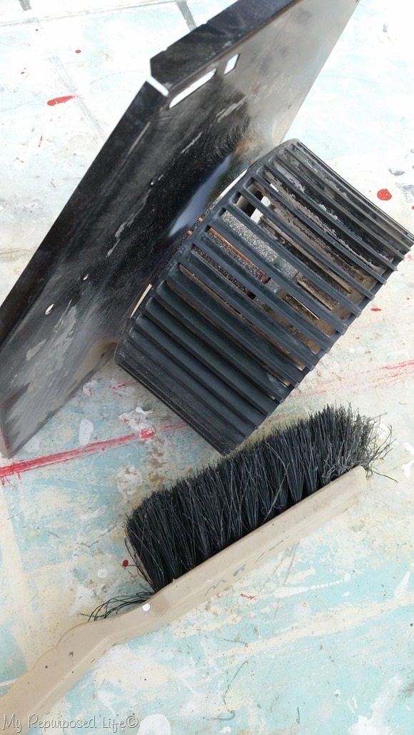 clean fan with dust brush