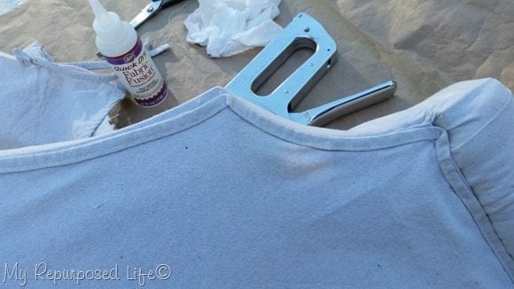 drop cloth hem as piping to cover up staples