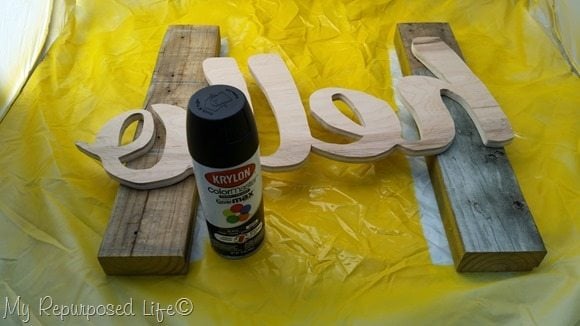 spray paint wooden cut out sign