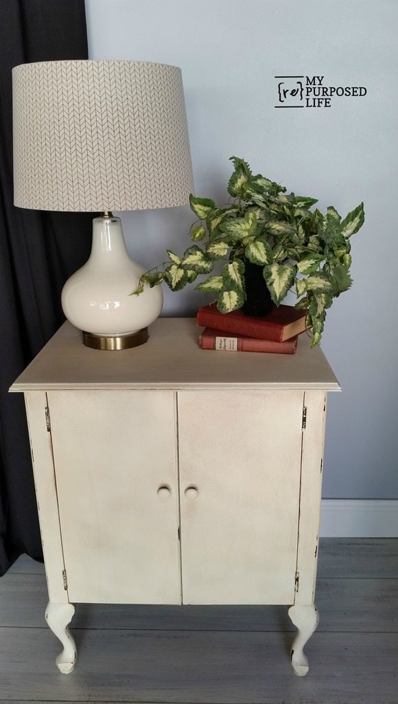 white entry way side table made from an old sewing machine cabinet MyRepurposedLife.com