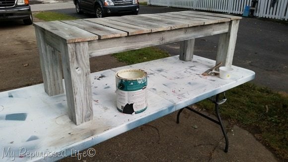 whitewashed outdoor bench or table