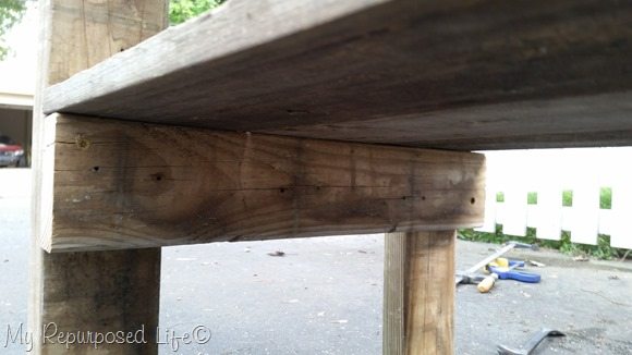 underneath side reclaimed wood outdoor bar