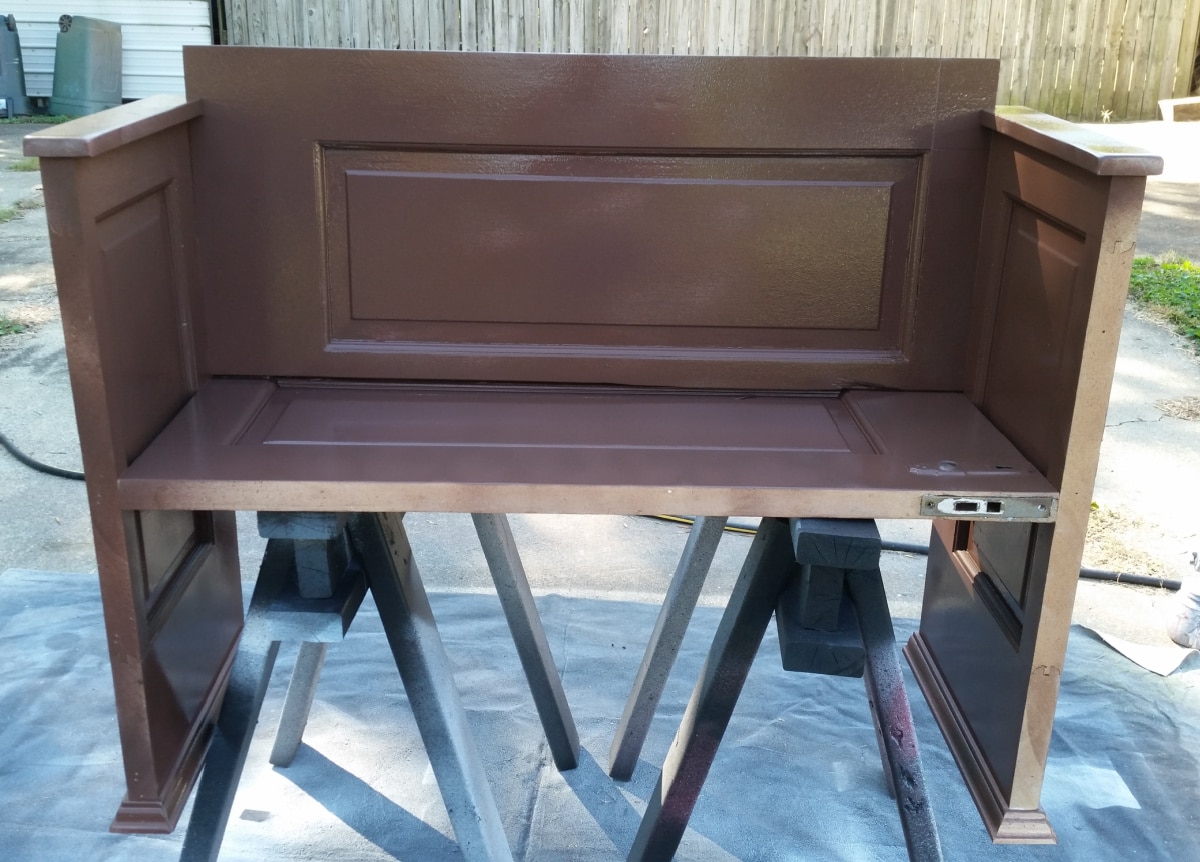 paint sprayer brown bench on sawhorses