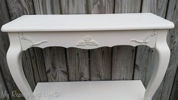 painted table shelves with appliques