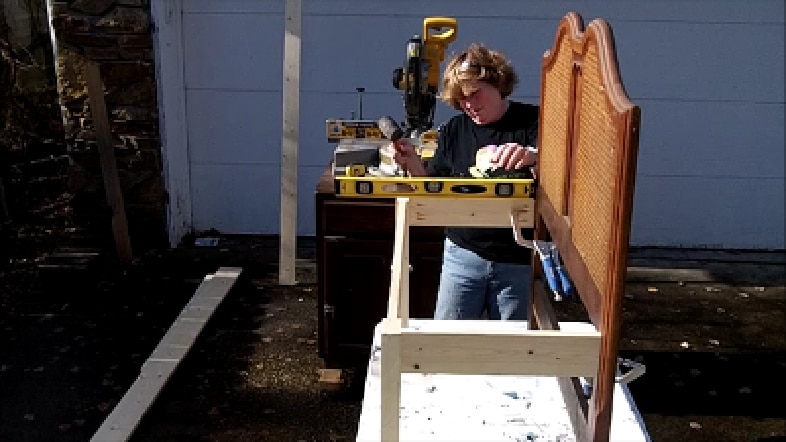 use level and right angle clamps to secure bench to headboard