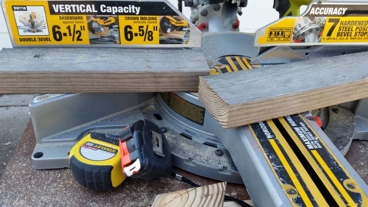 cut ladder shelves out of reclaimed 2x4s