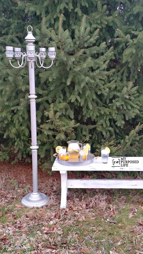 Repurposed floor lamp and a chandelier make a great garden or patio solar light feature. MyRepurposedLife.com