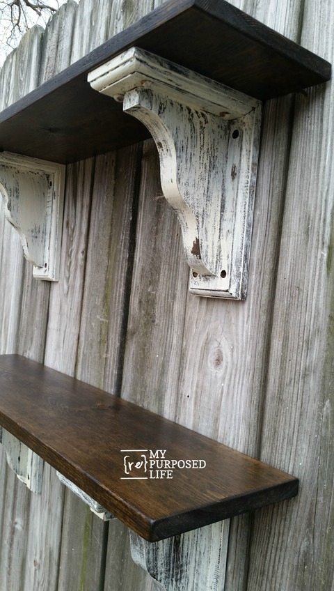 Easy to Make Farmhouse shelves for your home. Tutorial on assembling shelves using pre-made corbels. Tips on painting and staining the perfect farmhouse look. #MyRepurposedLife #repurposed #farmhouse #shelf #diy #project via @repurposedlife