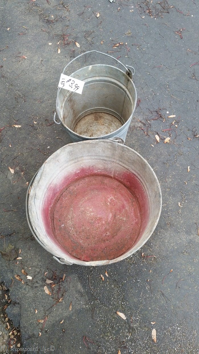 beat up galvanized buckets