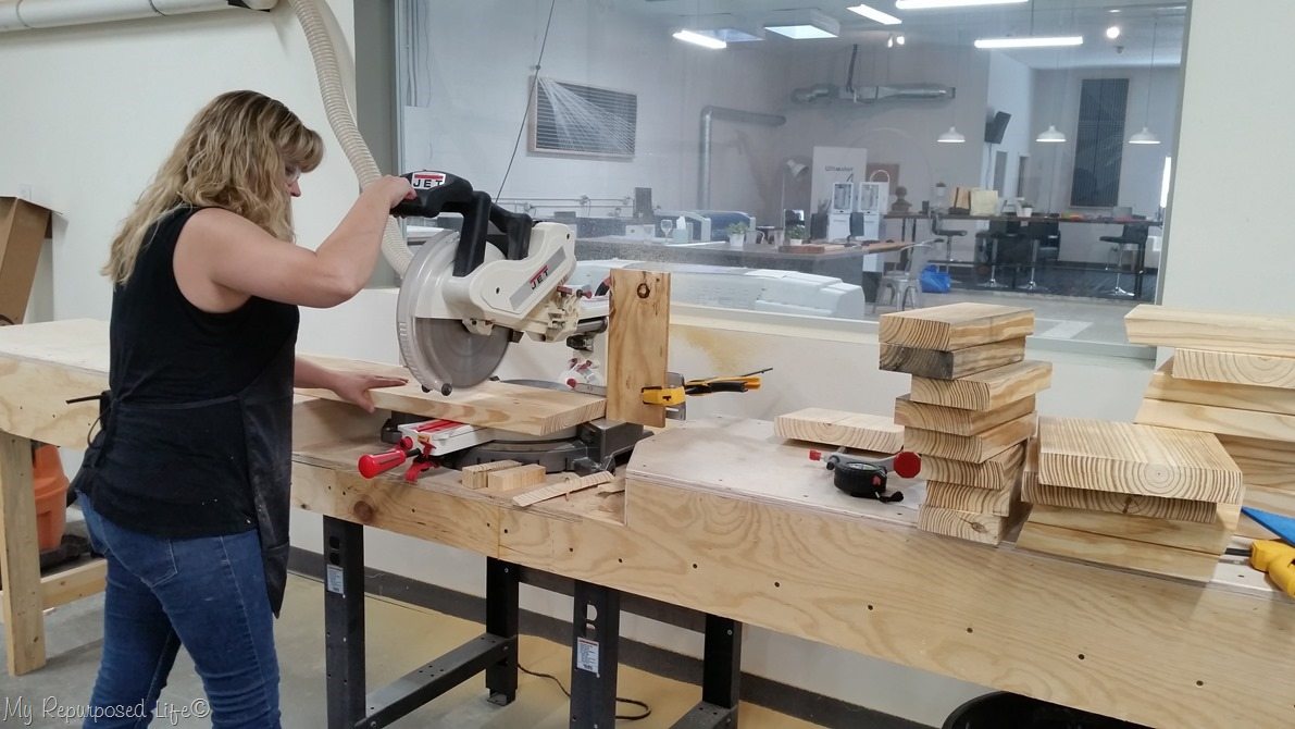 Angie cutting wood for One Board Stool Workshop Angie cutting wood for One Board Stool Workshop