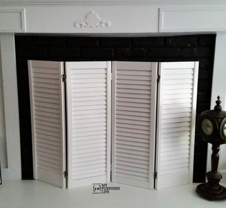 repurposed shutters fireplace screen