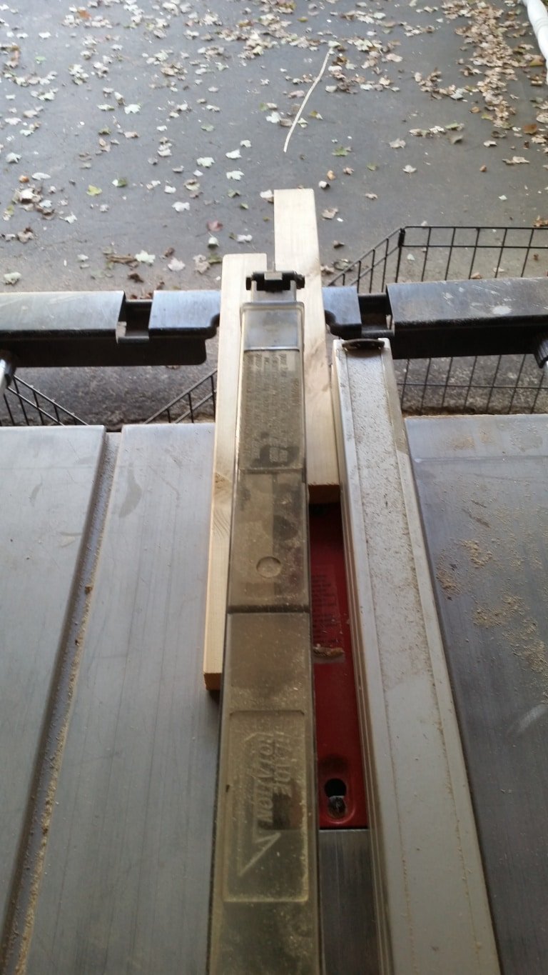 table saw cutting scrap wood