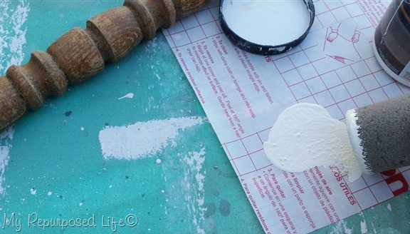 blot off excess paint spindle sign