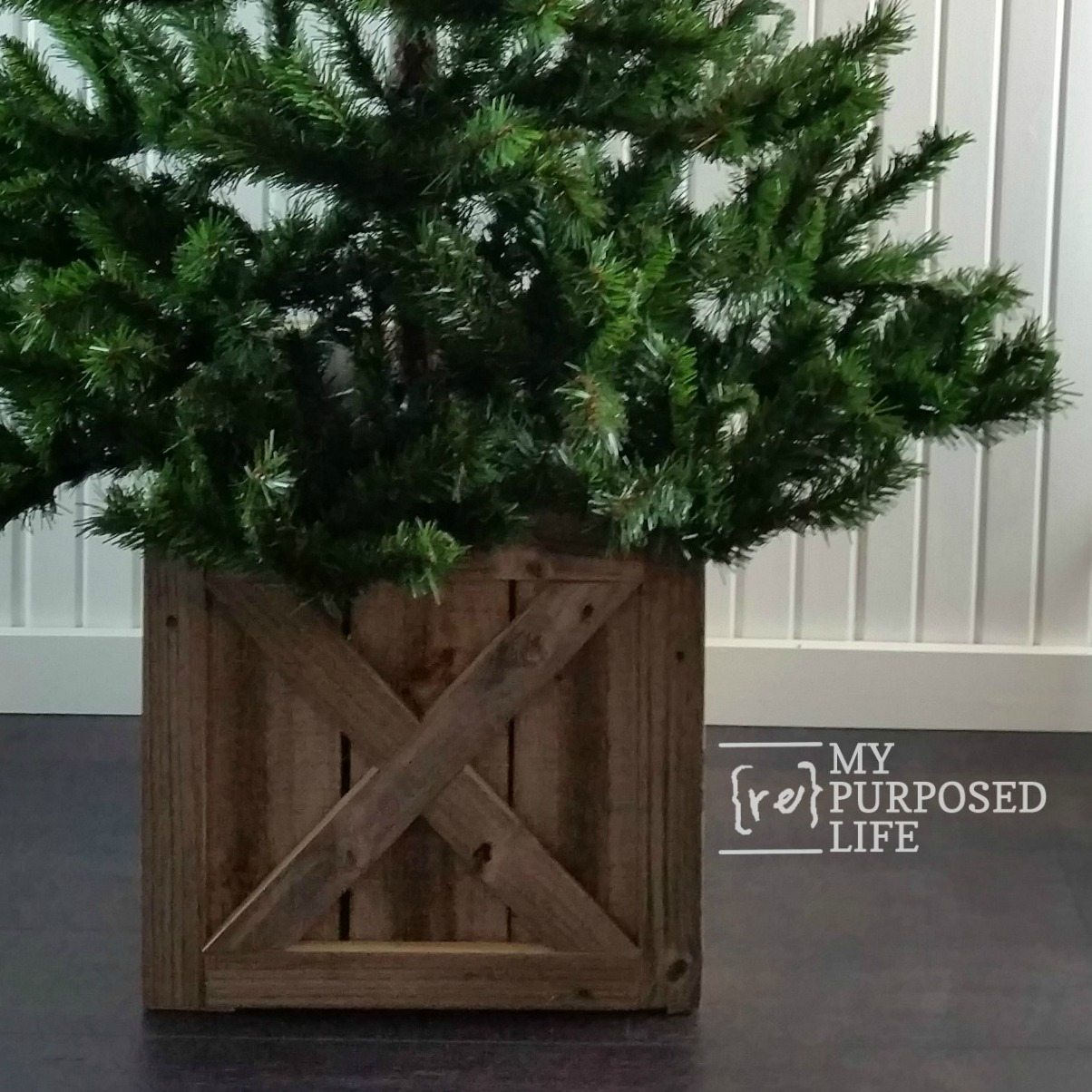 I transformed my cheap black planters into a chic wooden box for FREE, here’s how