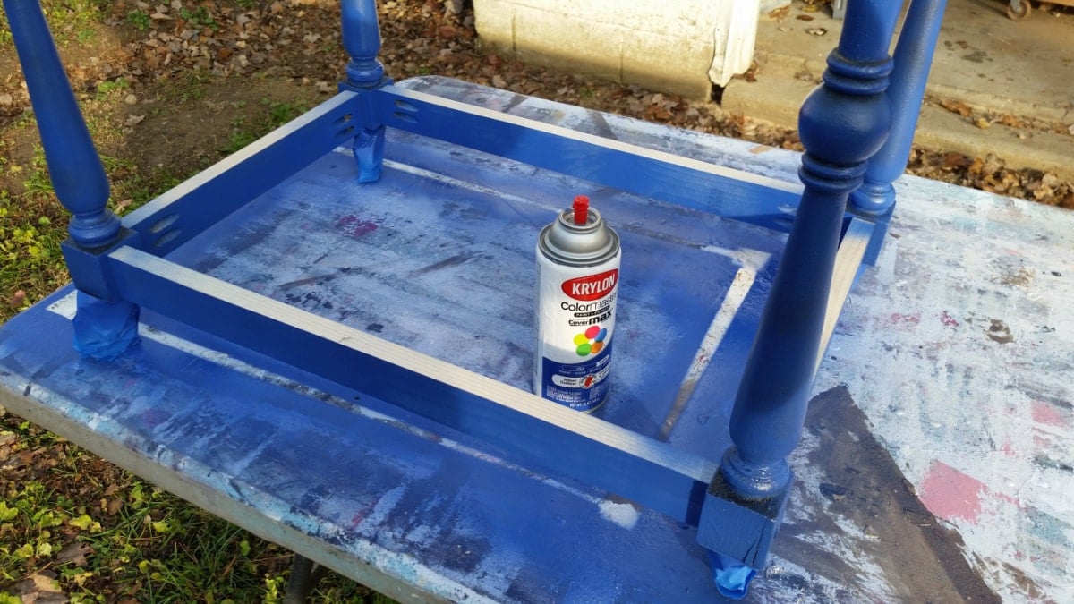 spray painting the laundry cart