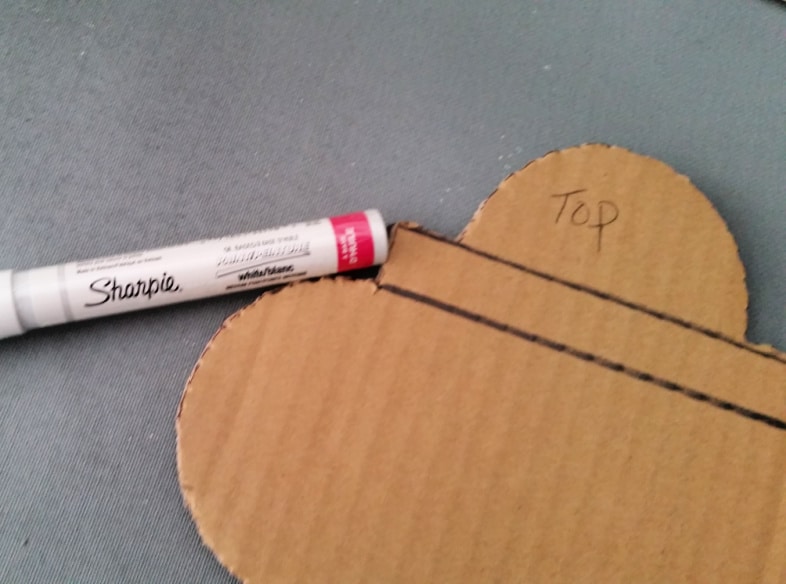 trace stencil on rug with oil sharpie