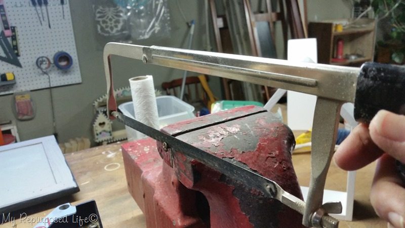 cut knob screw with hack saw