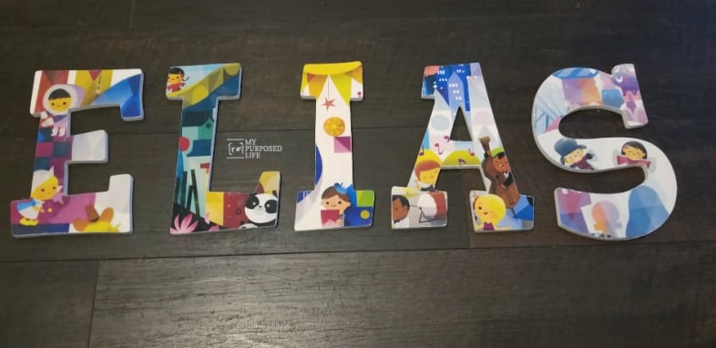 wooden letters ELIAS with colorful pictures decoupaged
