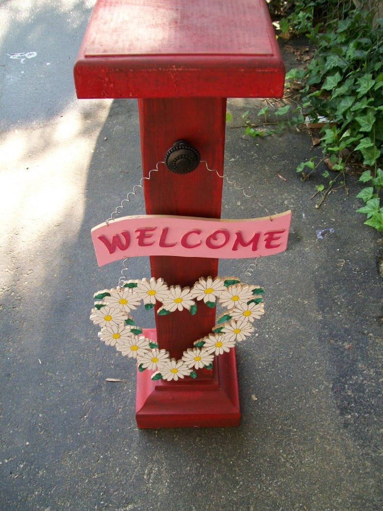 small red porch post