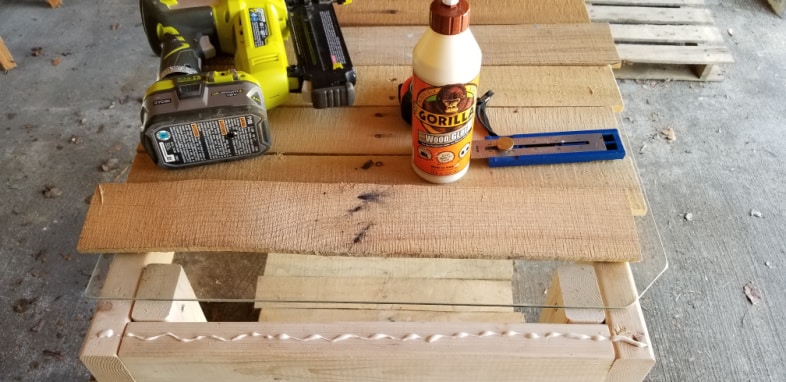 arrange pallet boards onto table top