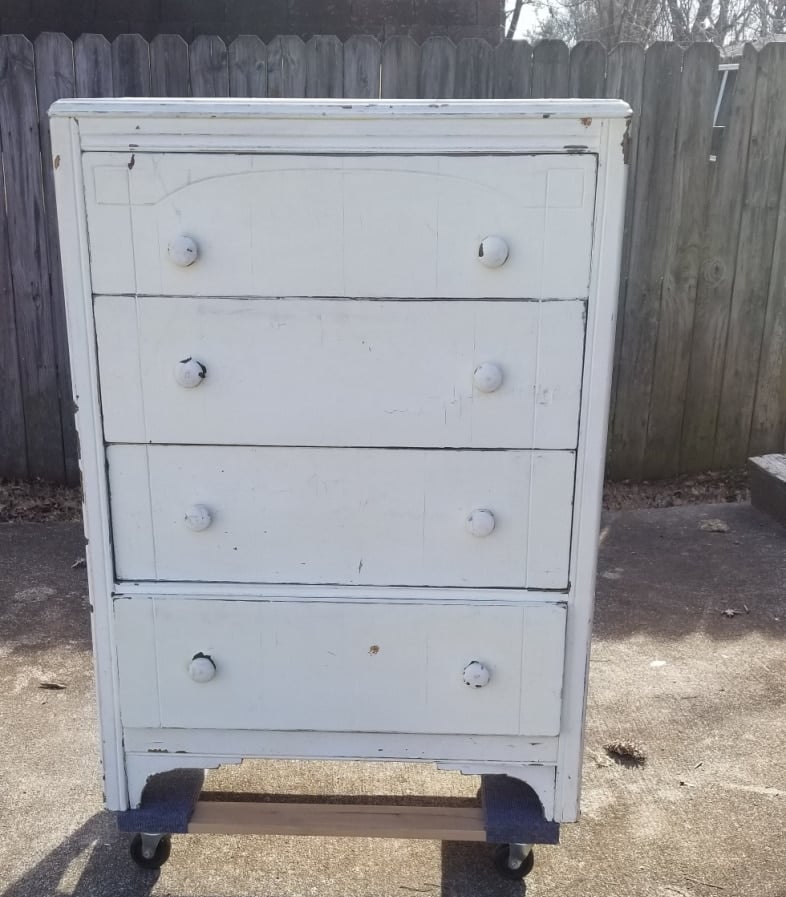 old chippy white chest of drawers before makeover
