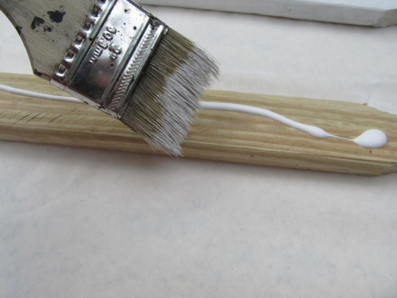 painting wooden stakes white