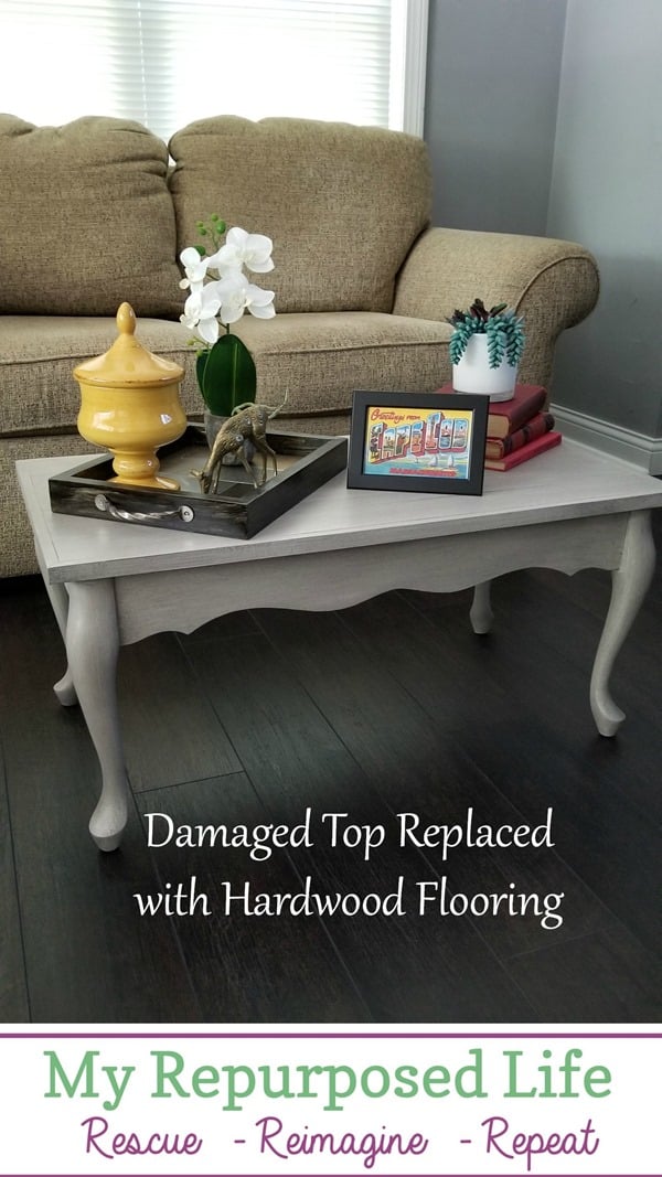 damaged queen anne coffee table top replaced with hardwood flooring MyRepurposedLife.com