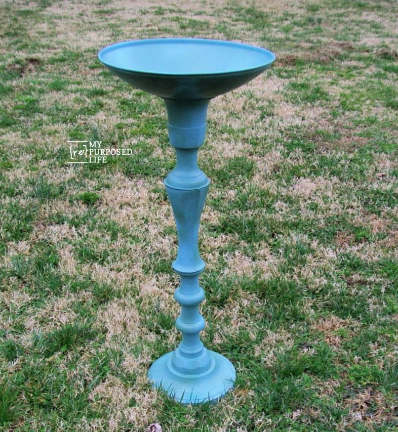 blue candlestick DIY birdbath in the yard