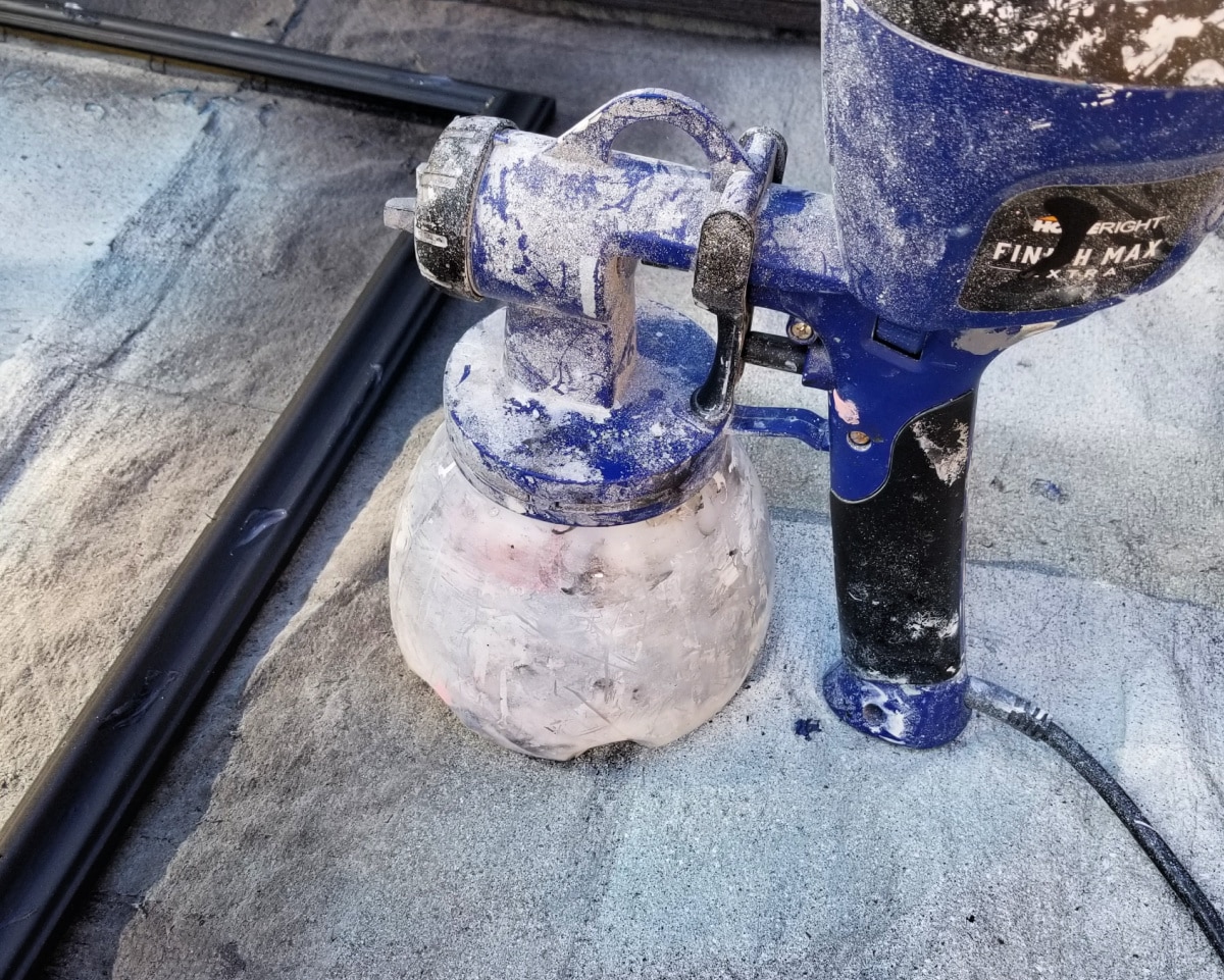 a black picture frame with petroleum jelly on it