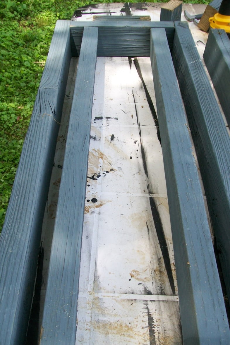 blue 2x4's make a bench seat frame