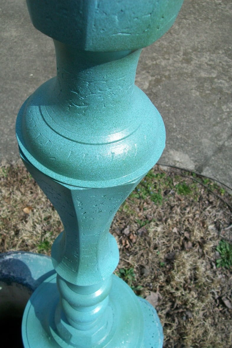 candlestick with a pretty blue green patina