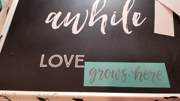 stay awhile love grows here chalkboard art