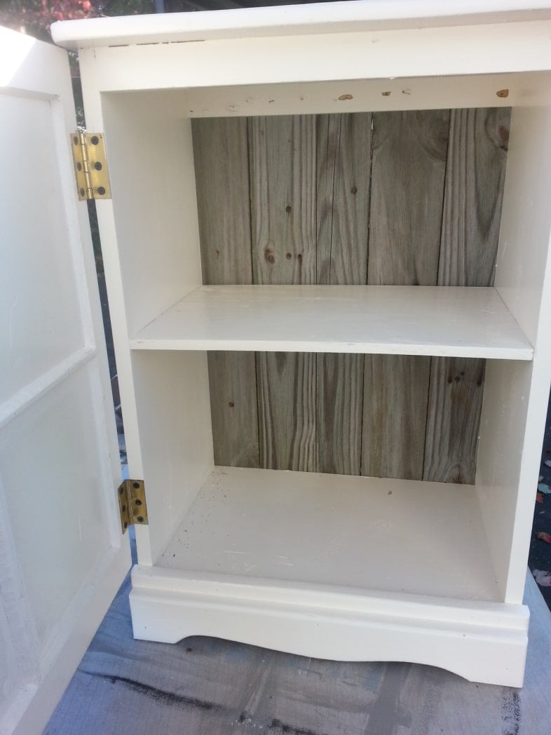 upcycled nightstand with reclaimed wood for the back