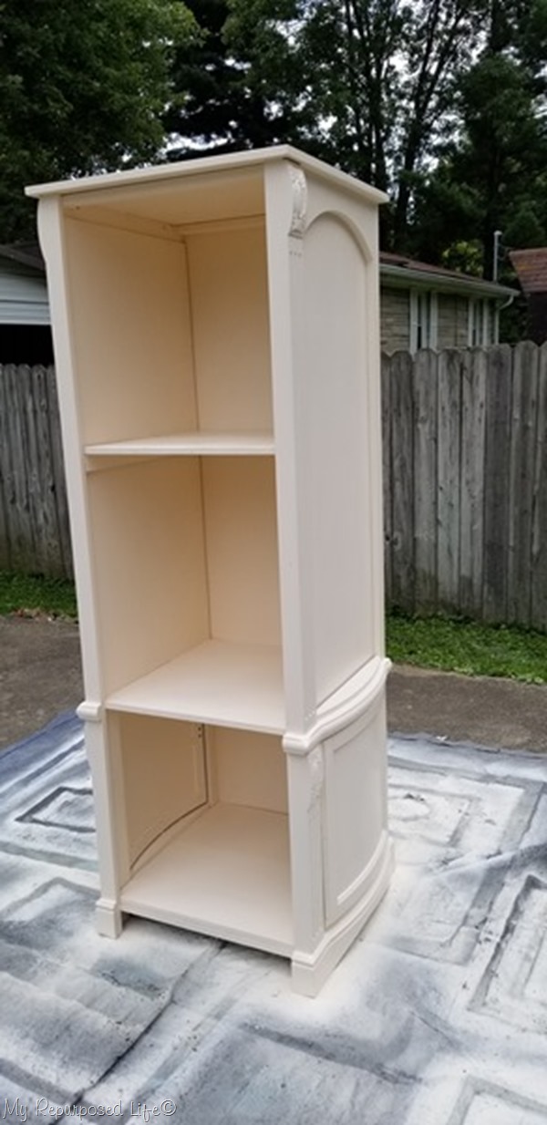 diy bookshelf made from reclaimed armoire doors