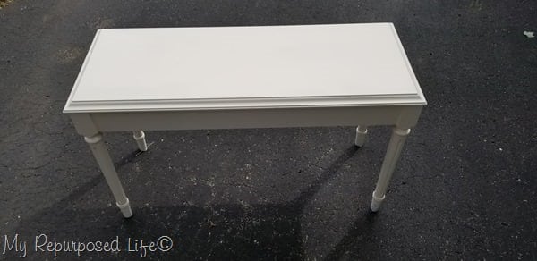 off white piano bench