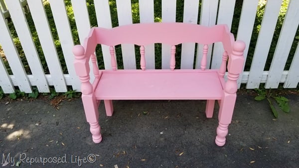 small pink wooden bench for toddlers or dolls
