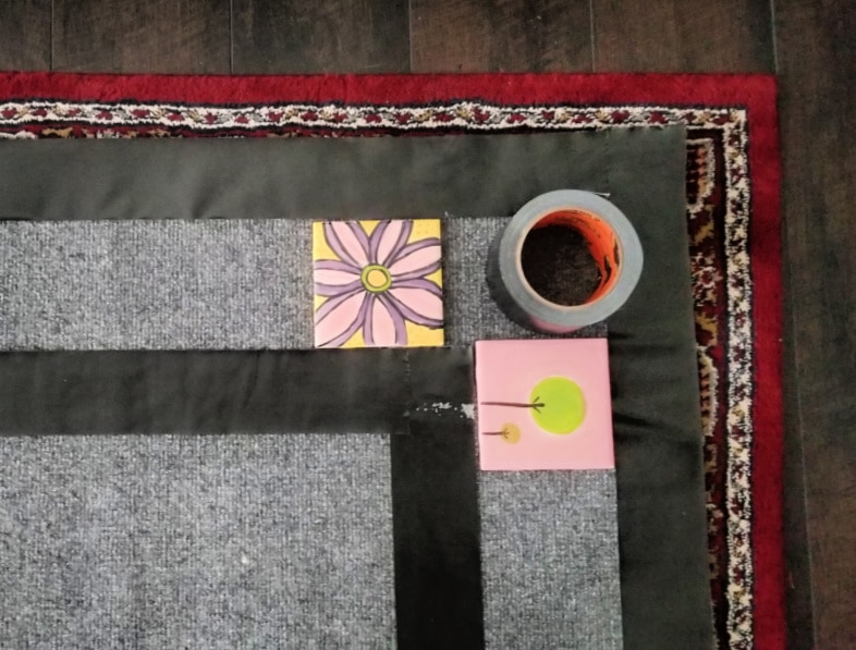 tape gray rug for painting
