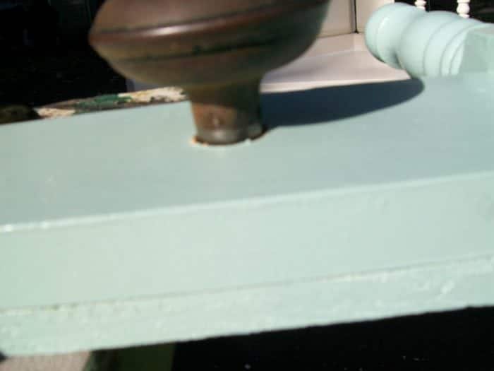 vintage doorknob makes a great hook for headboard coat rack