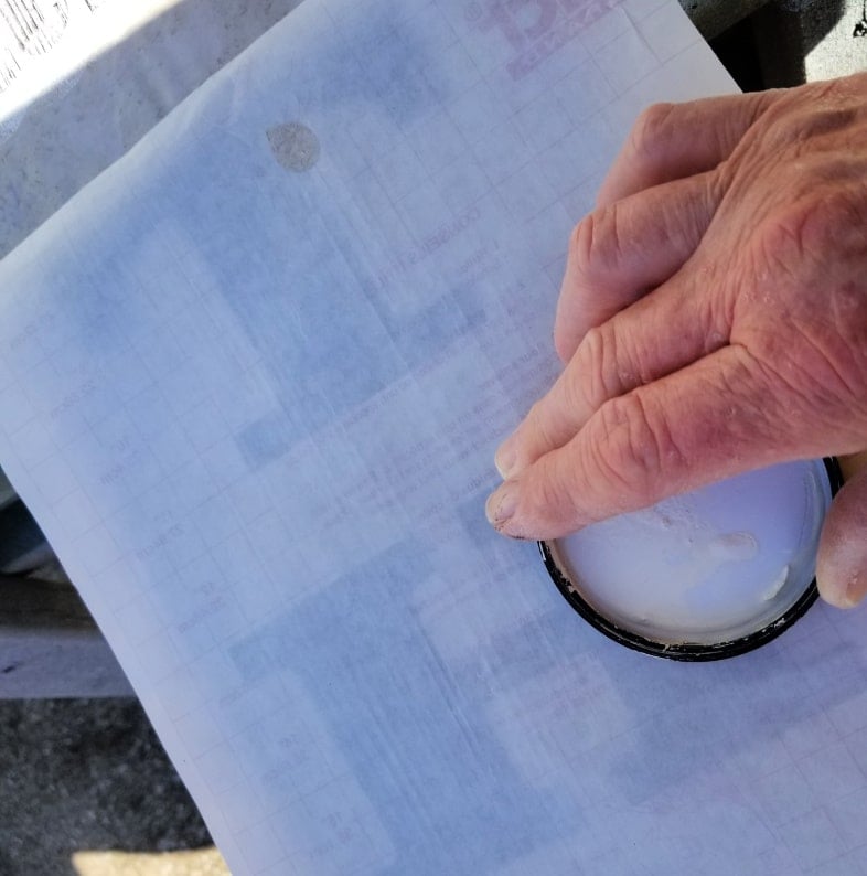 burnish the contact paper stencil using backing paper