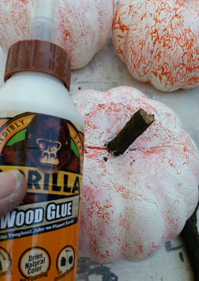 glue wooden branch stem to dollar store pumpkin