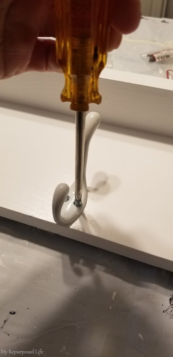 secure screw with screwdriver instead of power drill