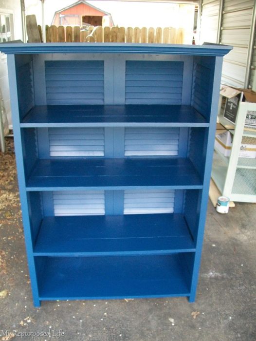 bookcase made from repurposed shutters